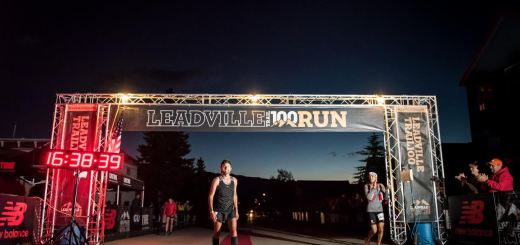 Michael Aish finishing the Leadville 100 Miler in 2014 with photo bomb Patrick Rizzo who helped pace. credit Irunfar.com/ Bryon Powell